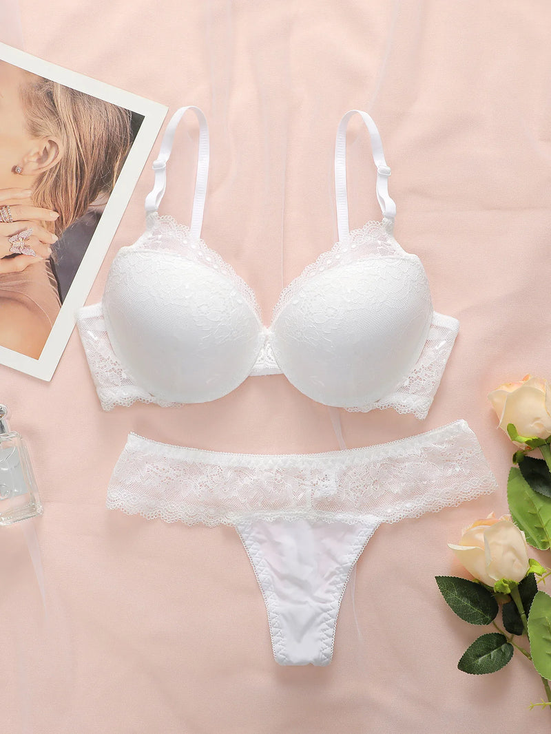 Hot selling women's sexy embroidered lace bra set with steel ring gathering push up and seamless thong set B6064